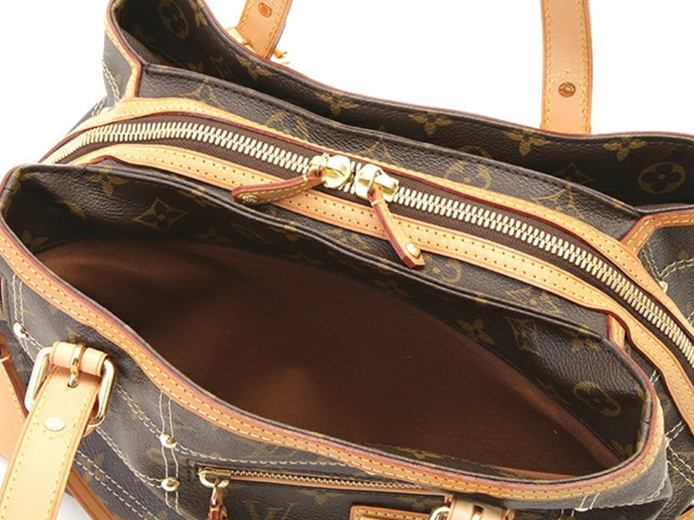 LOUIS VUITTON Rivete Monogram - Picture 8 of 8